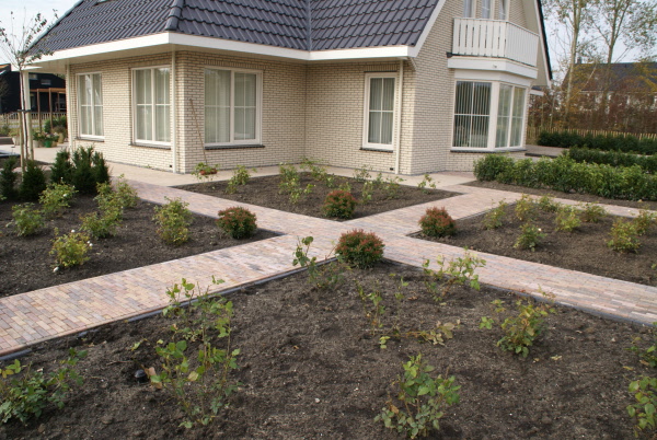 Landelijke tuin met veel beplanting en twee vijvers DECAtuinen hoveniers Almere Flevoland